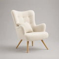 Fauteuil rembourré en polyester bouclé écru avec pieds en bois clair structure enveloppante 75 x 85 x 95 cm